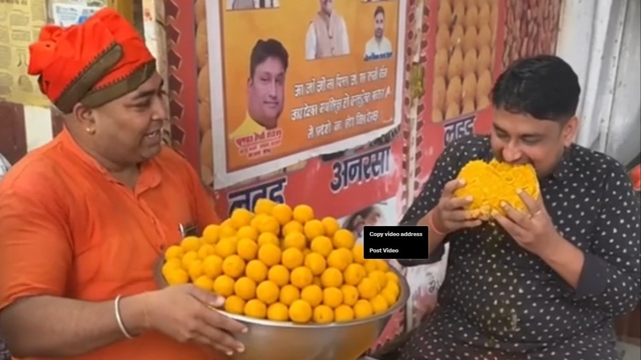 BJP workers celebrate Neeraj Sinha's win with laddoos